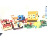 A collection of fisher price toys including a 1970