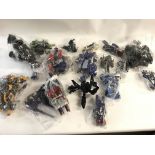 Large collection of various transformer figures. N