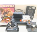 A Boxed Grandstand Video Sports Centre with 2 Games. A Demon Driver Electronic game and a