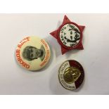 1960s Original Football Badges: Circular metal portrait badges of George Best and a red star badge