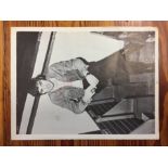 George Best Signed Magazine Picture: 28 x 21cm black and white picture hand signed on both sides