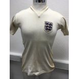 England Match Worn Football Shirt: White Bukta short sleeve shirt with 3 lions badge. Blue number