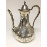 A silver coffee pot, circa 1856. The approximate w