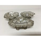 A pair of silver dishes with pierced edges London