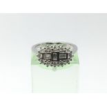 An 18ct white gold diamond fancy cluster ring, dia