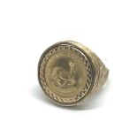 A 1/10 gold Krugerrand 1982 in a 9ct gold ring. To