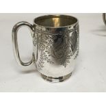 A Victorian silver Christening mug with initials a