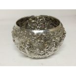 An elaborate white metal bowl possible Malaysian w