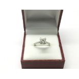 An 18ct white gold princess cut cut diamond ring ,