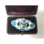 A cased 1930s silver and enamel Canada brooch.