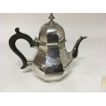 A Silver coffee pot with a hinged dome octagonal l