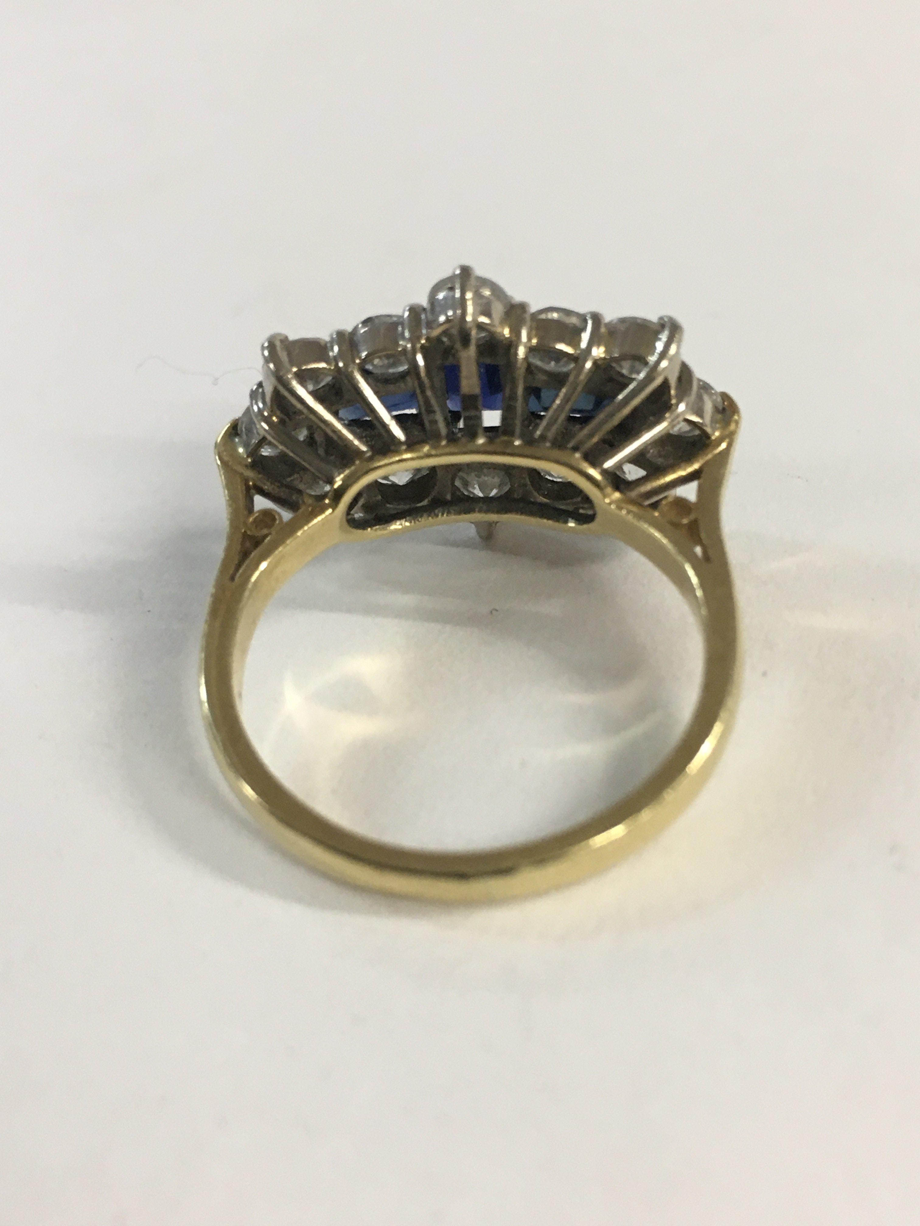 An 18c gold ring set with three sapphires and diam - Image 2 of 2