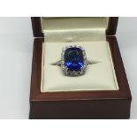 An 18ct white gold tanzanite ring, approx size L-M and approx 8.5g.