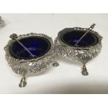 A pair of quality silver salut cellars with blue g