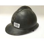 A WW1 French Adrian Helmet.