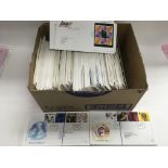 A box of GB first day covers, mostly from 2000 onw