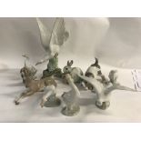 A Collection of Lladro animal figures including do