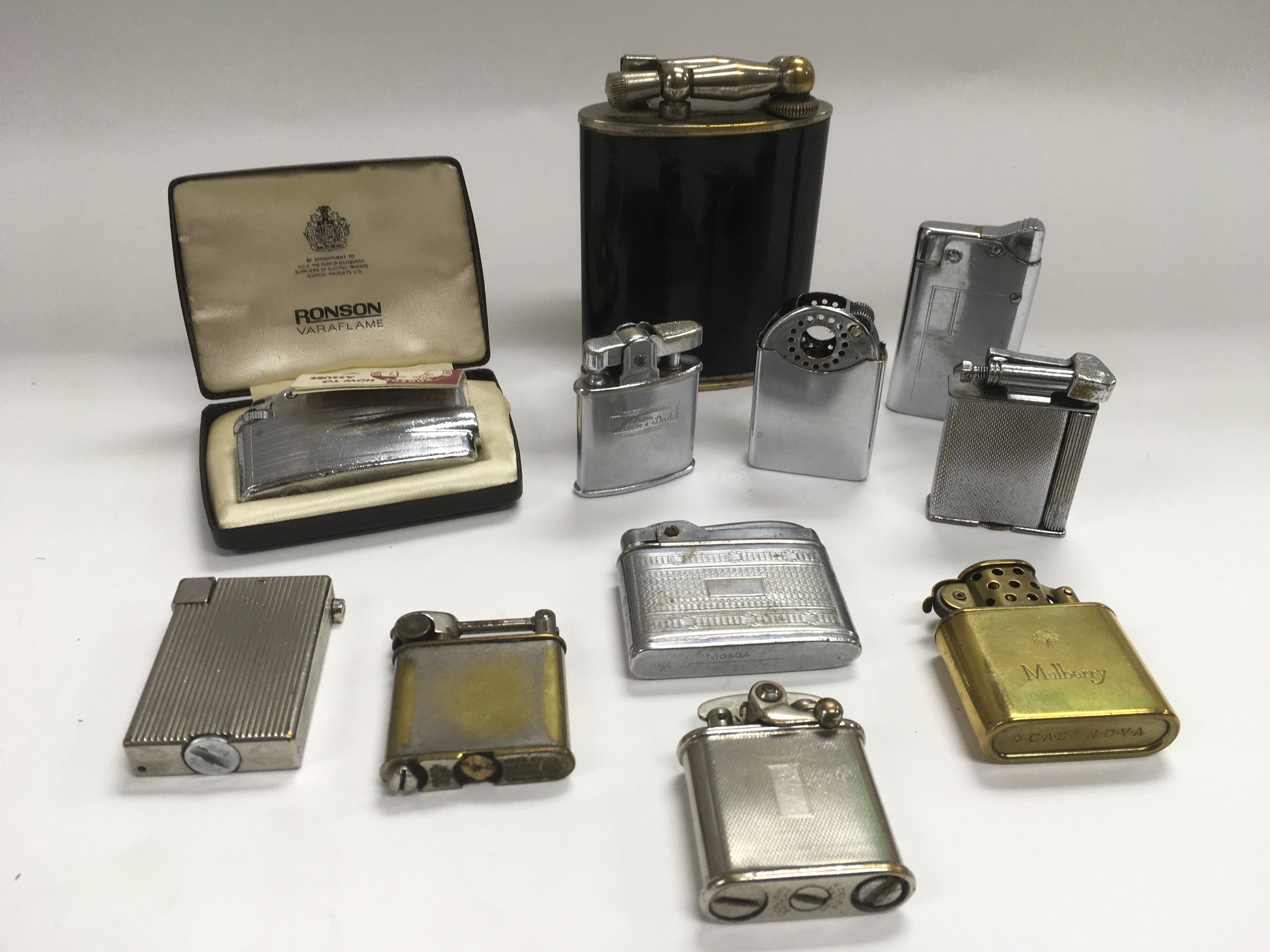 A collection of vintage lighters including a 1930s