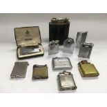 A collection of vintage lighters including a 1930s