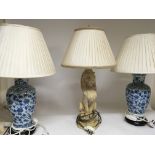 A Simulated lime wood lamp in the form of a lion by Thomas Blackmore and two Chinese vases lamps all