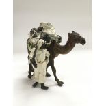 A Bergman cold painted bronze of a camel and handl