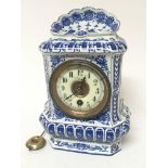 A Dutch delft clock fitted with a key wind mechani