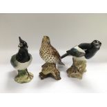 Three Beswick figures of birds comprising a Lapwin