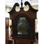 A modern longcase clock with a brass dial silvered