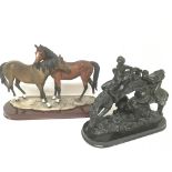 Two equestrian figure groups on oval hardwood base