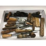 A collection of various vintage woodworking tools.