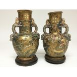 A pair of late 19th century Satsuma vases that hav