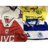 A collection of vintage replica football shirts co