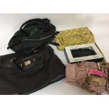A collection of pre-owned designer ladies handbags