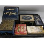 A collection of six vintage tins.