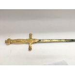 An ornamental sword with a finely decorated hilt i