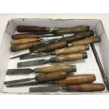 A collection of fifteen woodworking chisels, vario