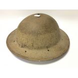 A British military issue tin helmet.