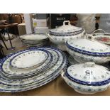 A Royal Doulton extensive dinner service with a bl