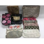 A collection of vintage beaded bags and make up ba