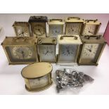 A box of brass carriage clocks and a collection of