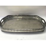 A large silver plated gallery dish.