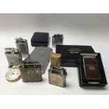 A collection of vintage lighters inc Dunhill.