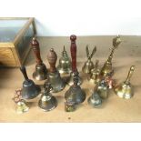 A collection of vintage hand bells.