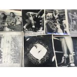 A collection of 7 press photographs of boxer Cassi