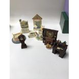 Eight boxes of miniature ceramic household furnitu