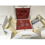 Two boxed Swarovski 1997 Collectors Society editions The Dragon in fitted boxes with outer boxes and