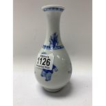 A small blue and white baulbous form bottle vase,