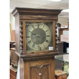 A 1930s oak longcase clock with brass dial - NO RE