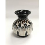 A small Moorcroft trial vase in 'Nine Ladies Danci