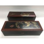 Two Japanese glove boxes decorated with birds.